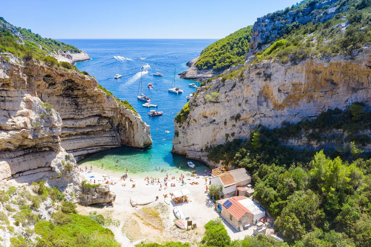 Stiniva cove enclosed by cliffs on Vis island, Croatia